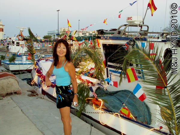 jacq+fishing boats: spain santa Pola Fiesta La Virgen del Carmen, patroness of fishermen, fishing boats, flags buntings