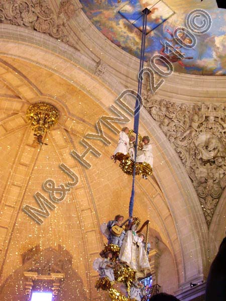 misteri de elche: spain elche Fiesta Misterio de Elche Mystery Play of Elche Pomegranate apparatus, blue-domed ceiling Basilica de Santa Maria gold tinsel from Door of Heaven