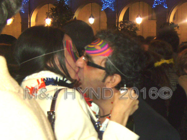 spain downtown Alicante, fiesta nochevieja New Years Eve, revellers kissing