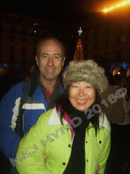 spain downtown Alicante, fiesta nochevieja New Years Eve, revellers warm gear