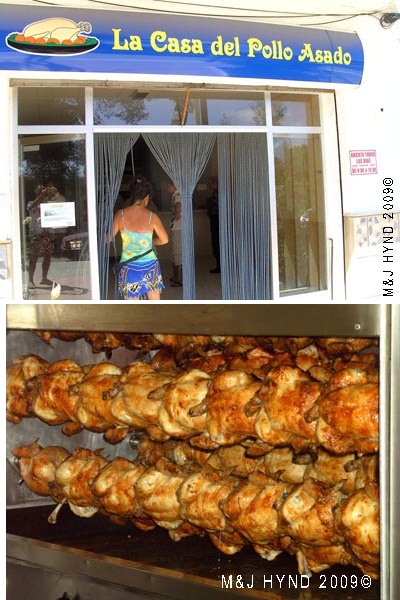 Spain La Marina La Casa del pollo asado shop, rotisserie roasted chicken in the cooker