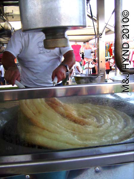 spain Santa Pola Saturday market stand van cook churro