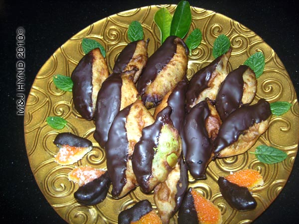 spain perleta home kitchen recipe valentines day treat decorate presentation, chocolate orange-leaves, orange peel, orange hearts, mint, orange leaves