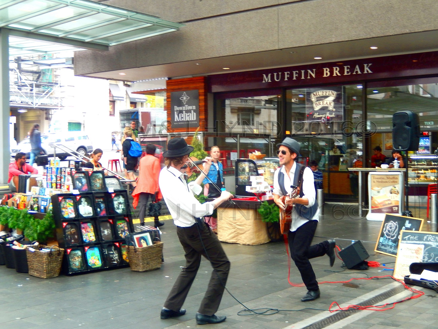 waterfront lively buskers at Muffin Break Queen St, Auckland, NZ