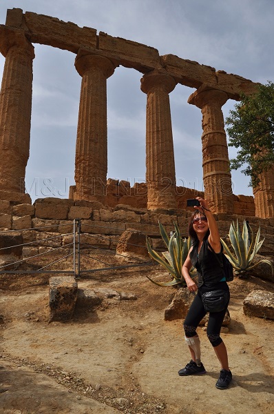 selfie on sloping ground, ruins Valley of the Temples, Agrigento, Sicily