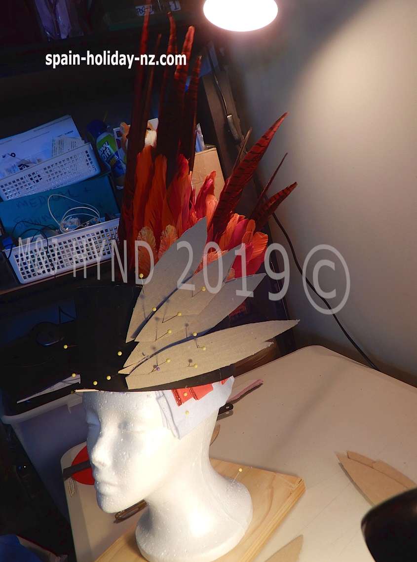 13: headpiece feathers, worbla, cardboard 