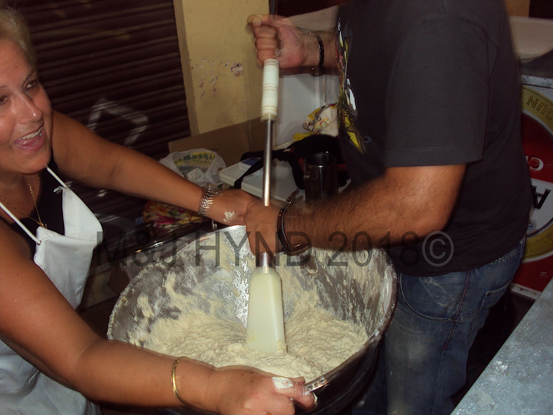 making Churros, to feed the faithful during Nit de la Roa