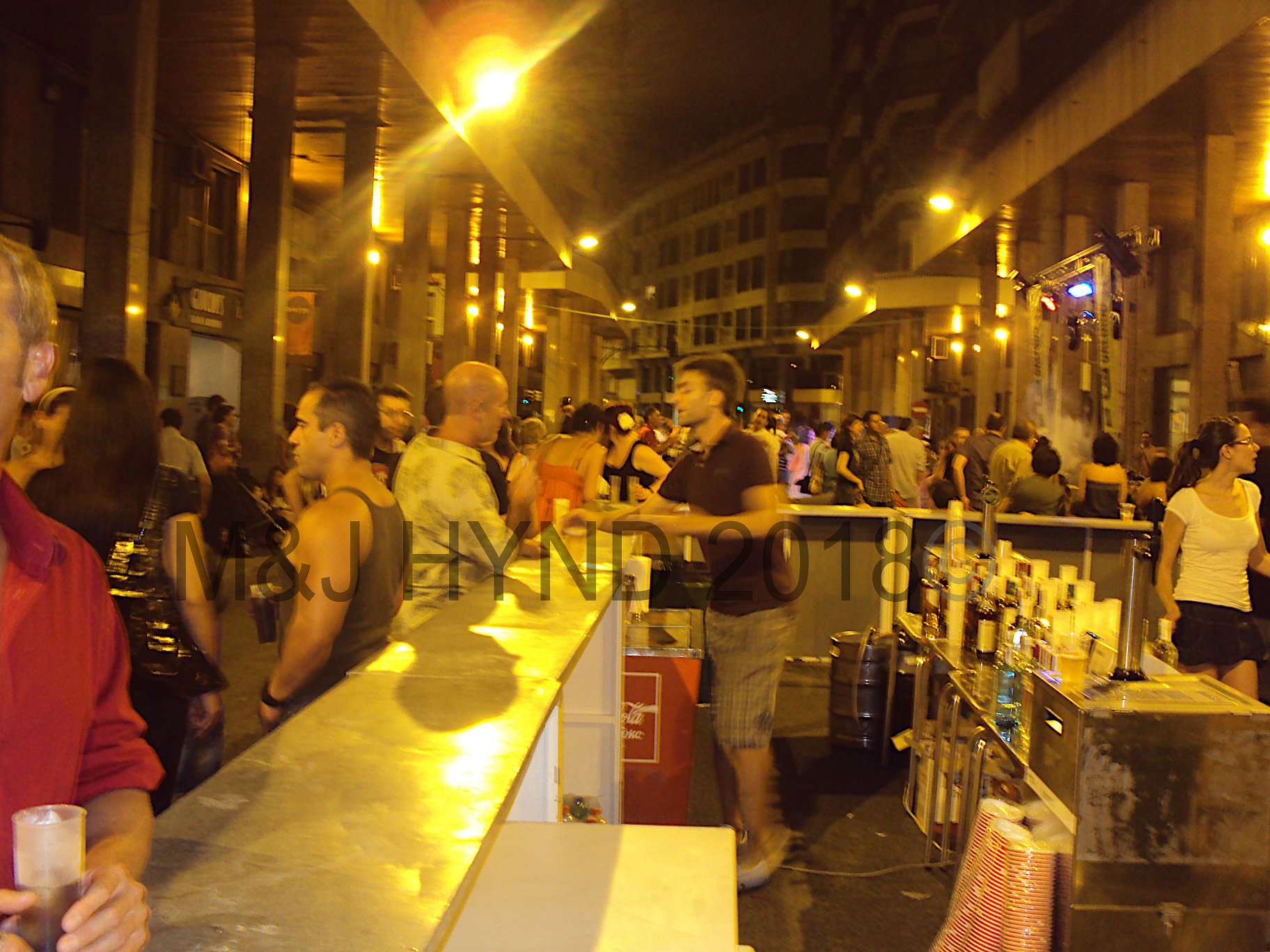 typically a busy street, tonight a huge open bar