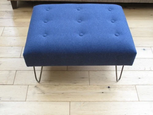 Contemporary denim blue wool industrial footstool.