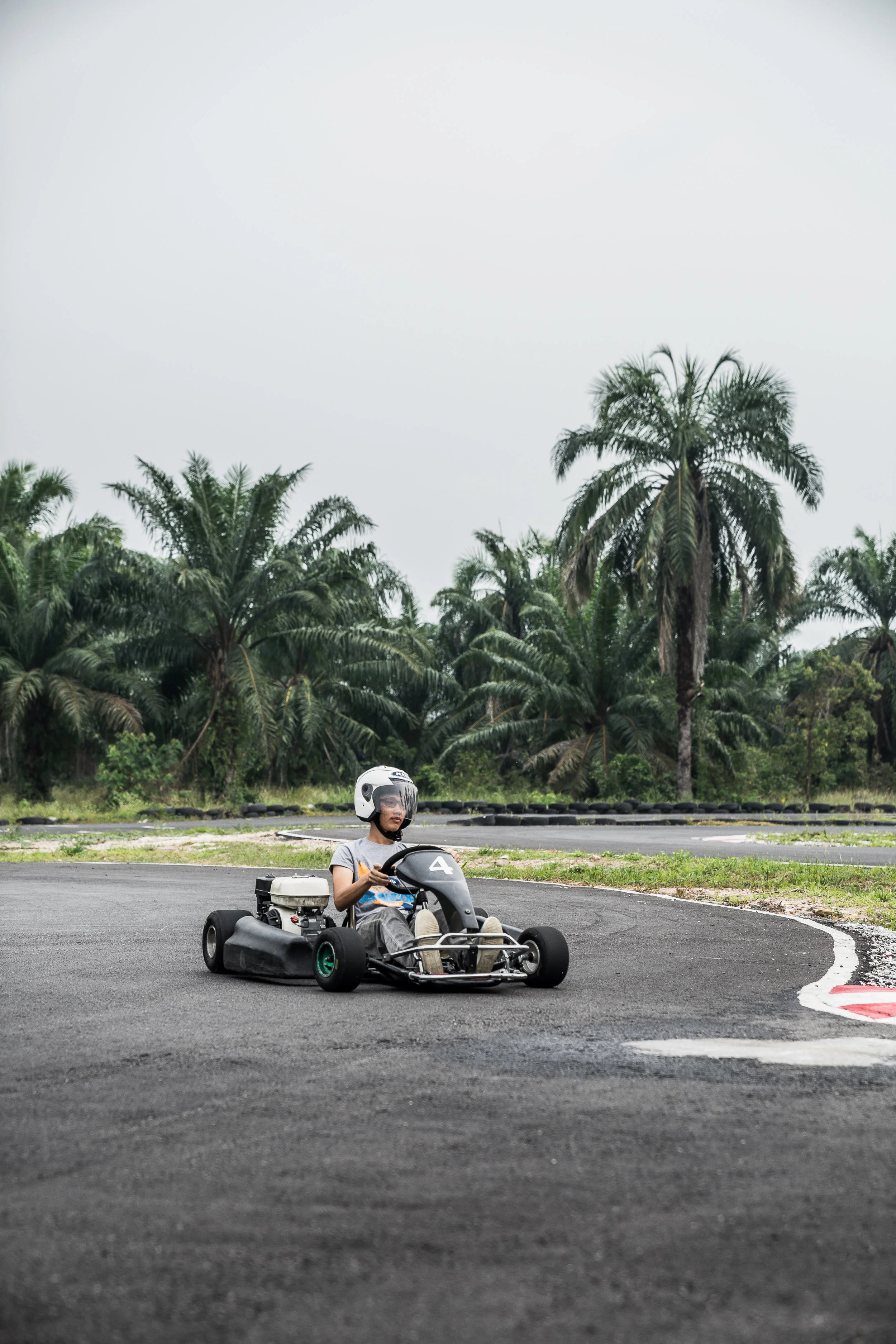 Hasif driving around the track.