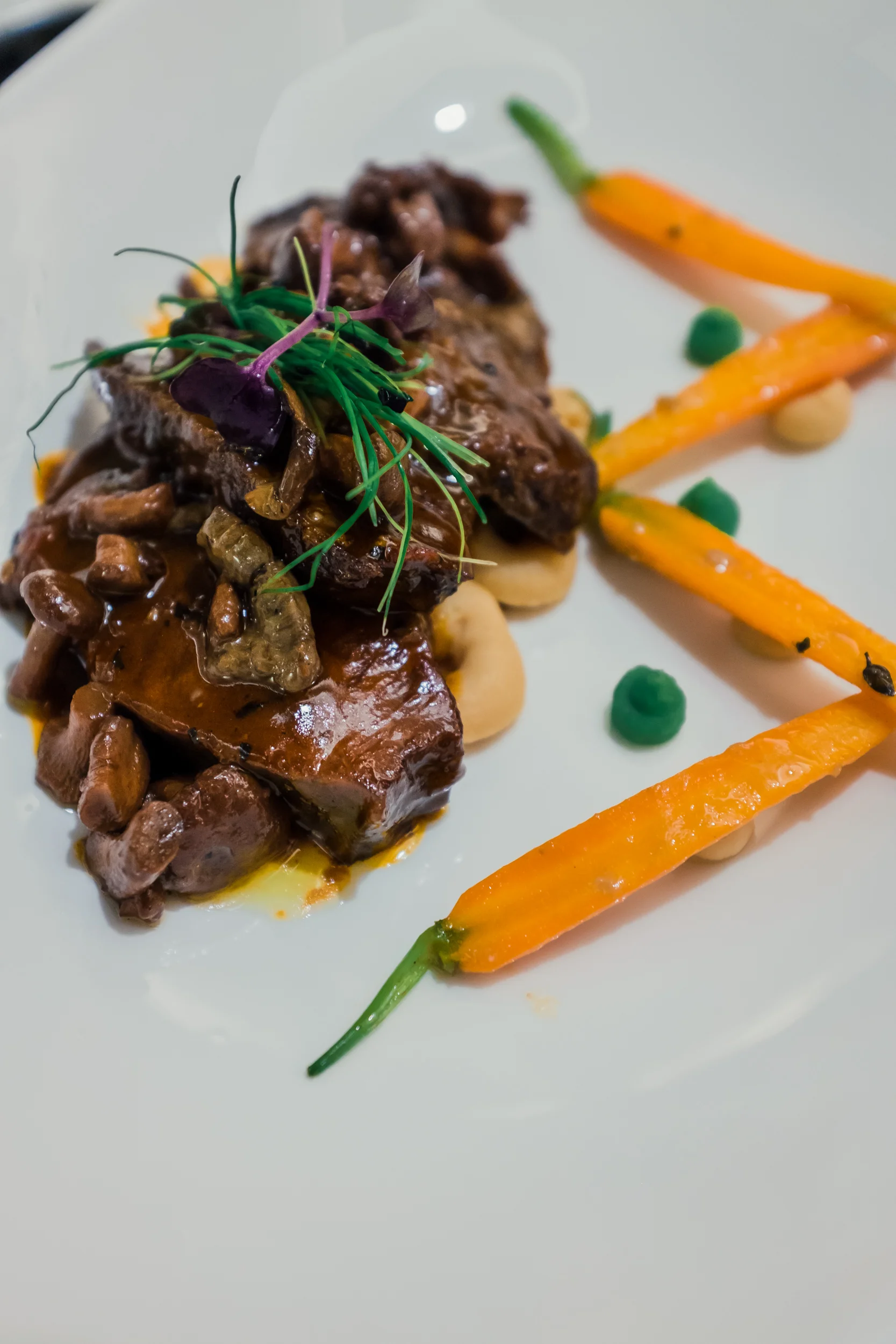 Slow Braised Wagyu Beef Cheek With Creamy Mash, Chanterelle Mushrooms and Veggies