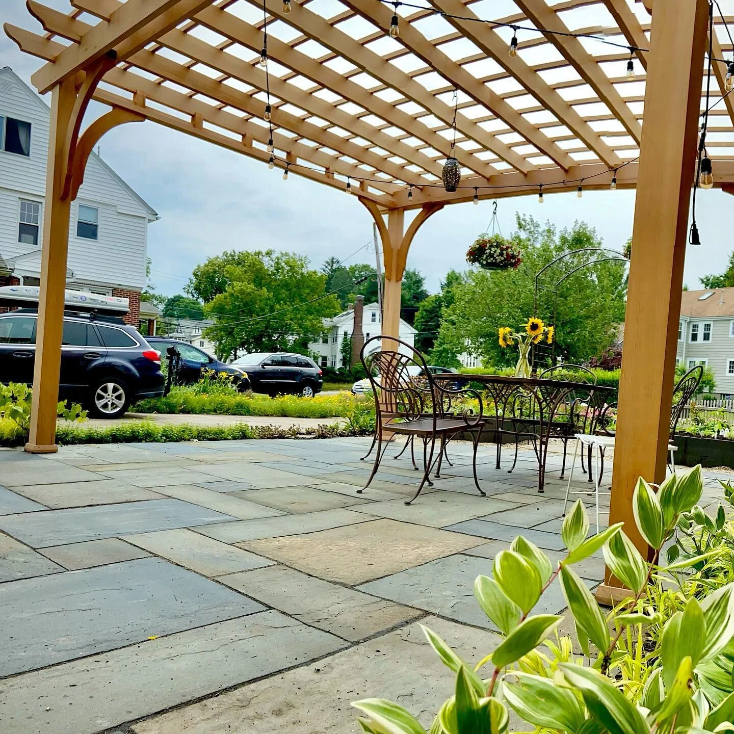 We just finished planting a #pollinatorgarden and steel #raisedbeds next to a western red cedar #pergola and #bluestone #patio we designed and installed. Excellent work team! We&rsquo;re looking forward to seeing this garden become established and #g