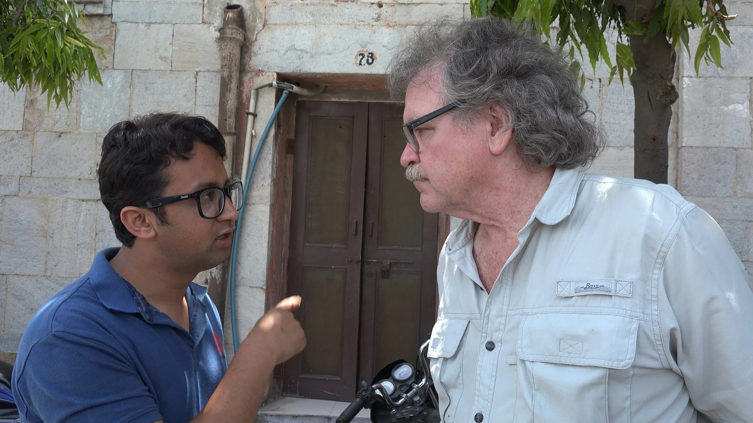 Bal Ashram staffer Kalpesh Dobal and Len Morris waiting at the police station © Jatin Makkar