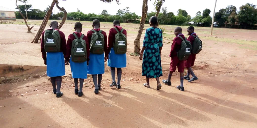 Kenyan Schoolhouse kids and their teacher © ANPPCAN
