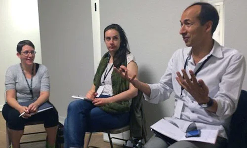Photo: SSL 15 participants Gabriel Robinson and Anita Ross listen to mentor Alex Boden