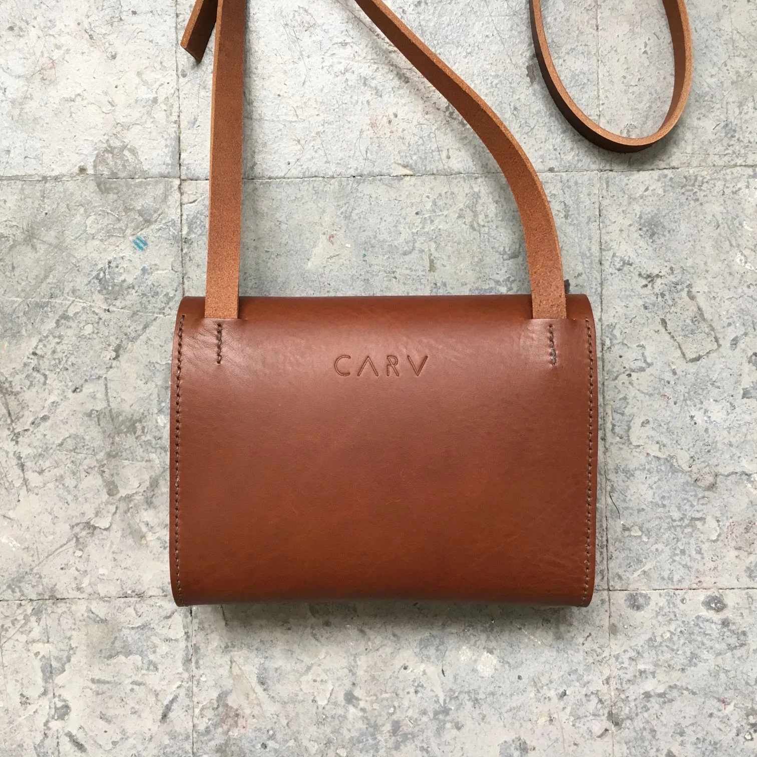 Rear of Brown leather crossbody bag by CARV made in London