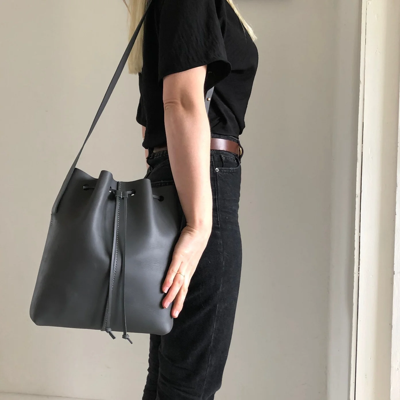 Grey leather minimalist crossbody leather bucket bag by CARV made in London