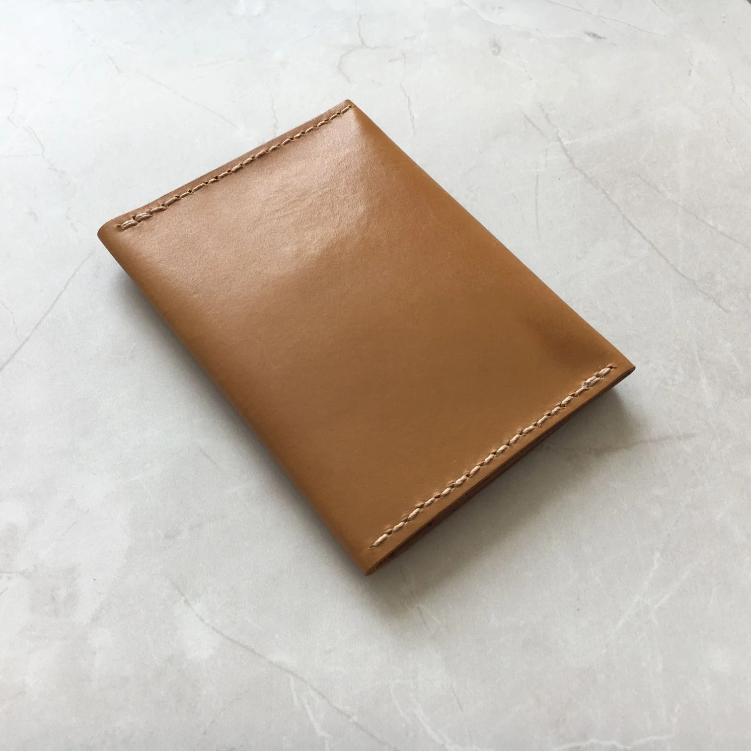 Tan sustainable leather bifold wallet card holder by CARV made in London