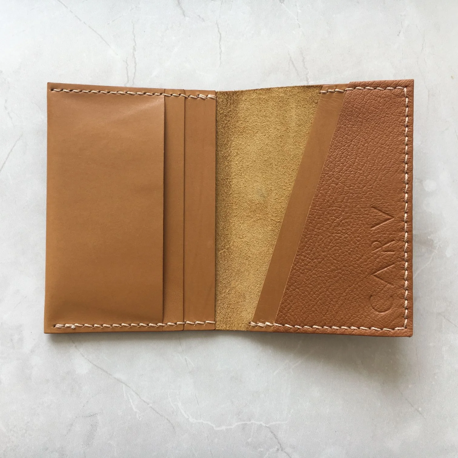 Inside the Tan sustainable leather bifold wallet card holder by CARV made in England