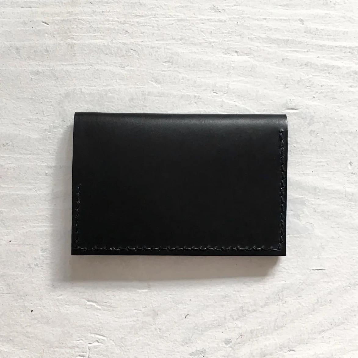 Black leather minimalist wallet card holder by CARV made in Britain