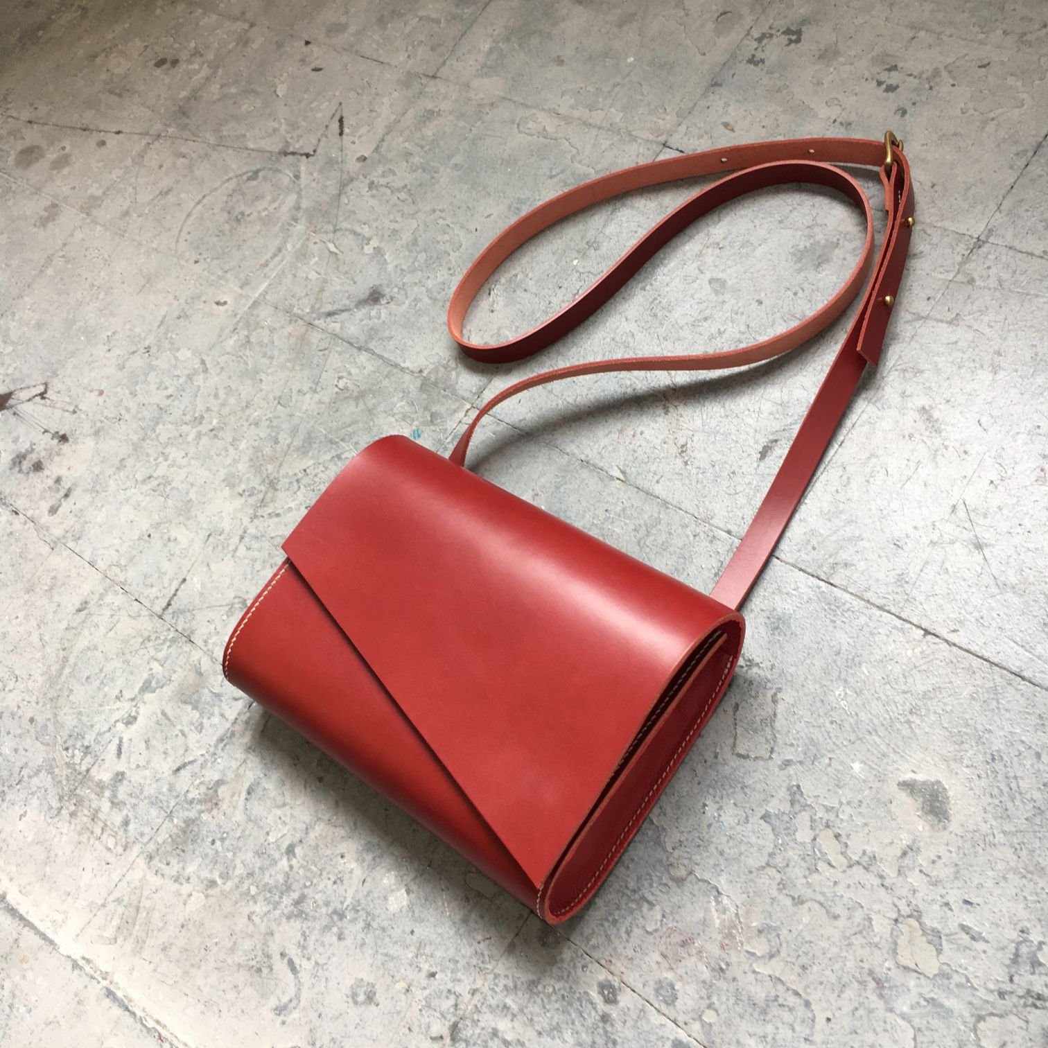 CARV sustainable leather bag in red handmade in the UK