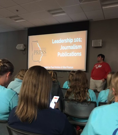 PAUL NICKLES, GSPA STUDENT ADVISORY BOARD MEMBER, AND SIBYL POSTON, CO-EDITORS OF THOMPSON HIGH SCHOOL’S ARCHIVE YEARBOOK, SHARE TIPS AND TRICKS FOR GROWING STAFFS DURING THE GSPA FALL CONFERENCE OCT. 22, 2018, AT THE UGA TATE STUDENT CENTER.