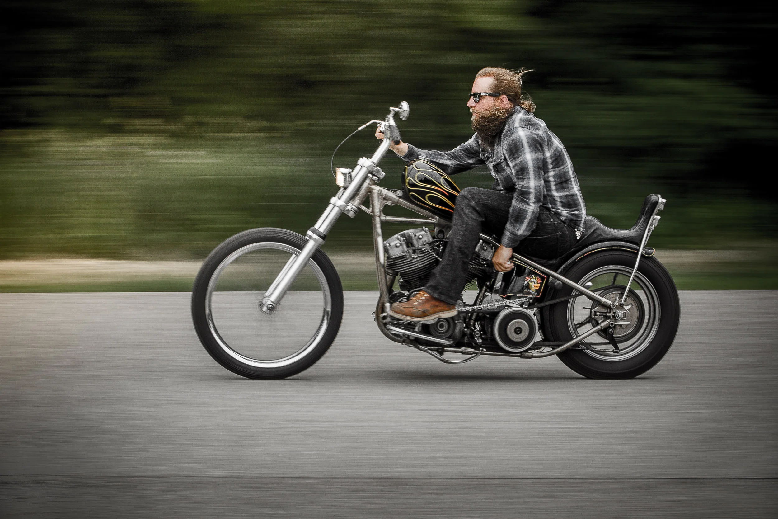  Bearded hipster lifestyle photography on a Harley Davidson Motorcycle.&nbsp; 