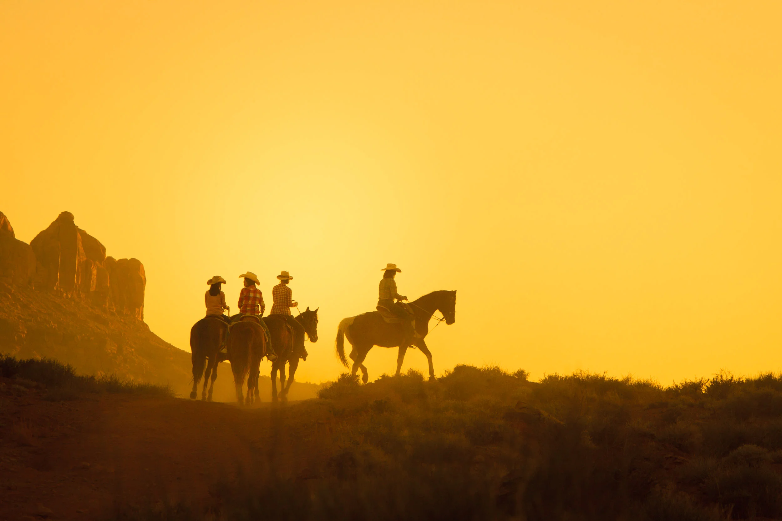 Cowboys Riding Horses in the Sunset - Moab, Utah
