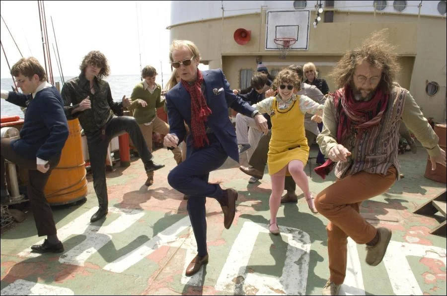Bill Nighy (center) is cool, no matter what. Pirate Radio, 2009.