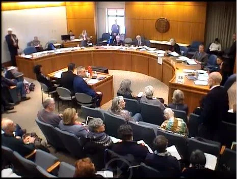 Dr. Madden (standing, far right) speaks to the Senate Public Affairs Committee on February 7 regarding SB 279.