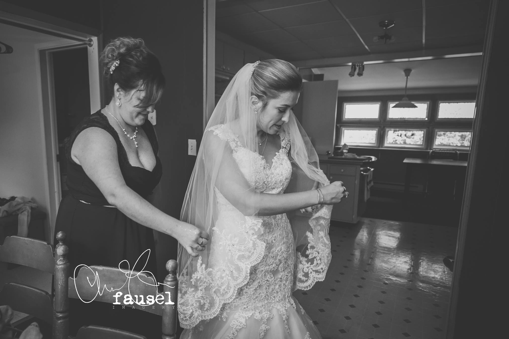The lace on Jess' dress stopped at 1.5" above her elbow so as not to compete with her dress bodice and bouquet!