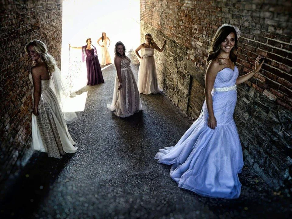 Photography Credit: EmanPhoto, Photographer: Emmanuel Vaucher. Dresses: Bridal Barn. Adornment's: Gee June.