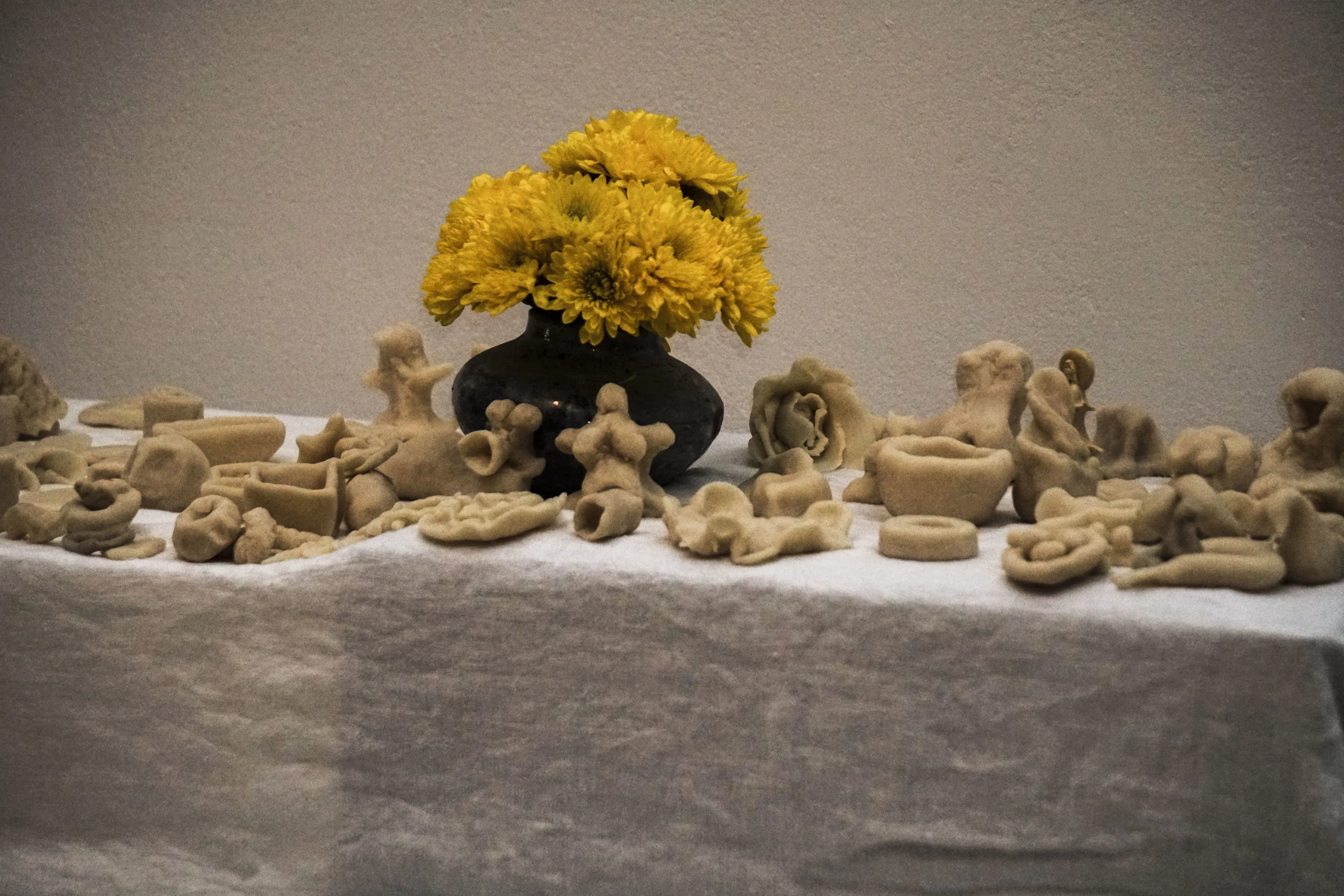 Dough offerings from the public on the altar created for maternal ancestors