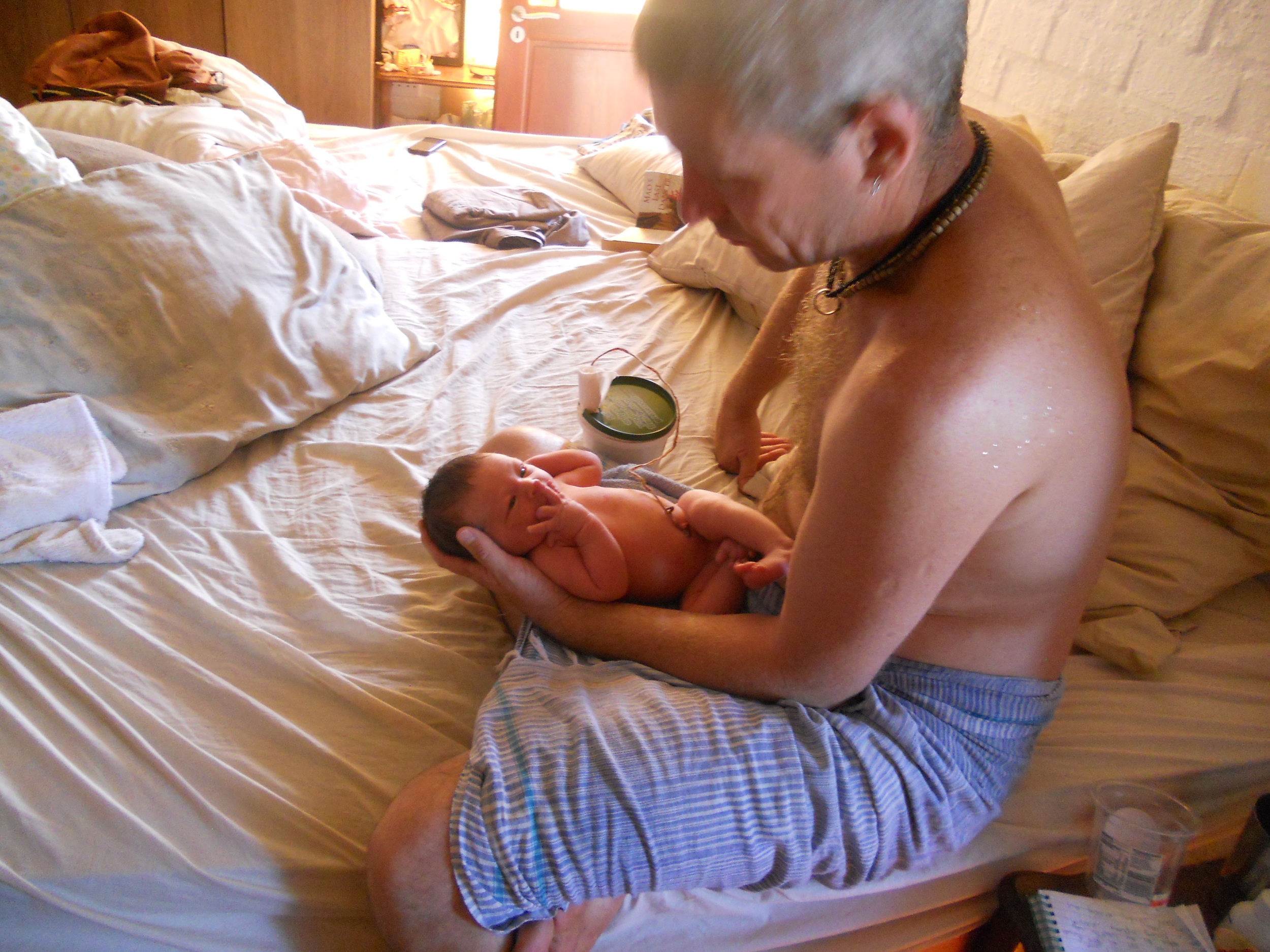 Dad could still interact, love and cuddle our baby. We even bathed him with his cord attached.