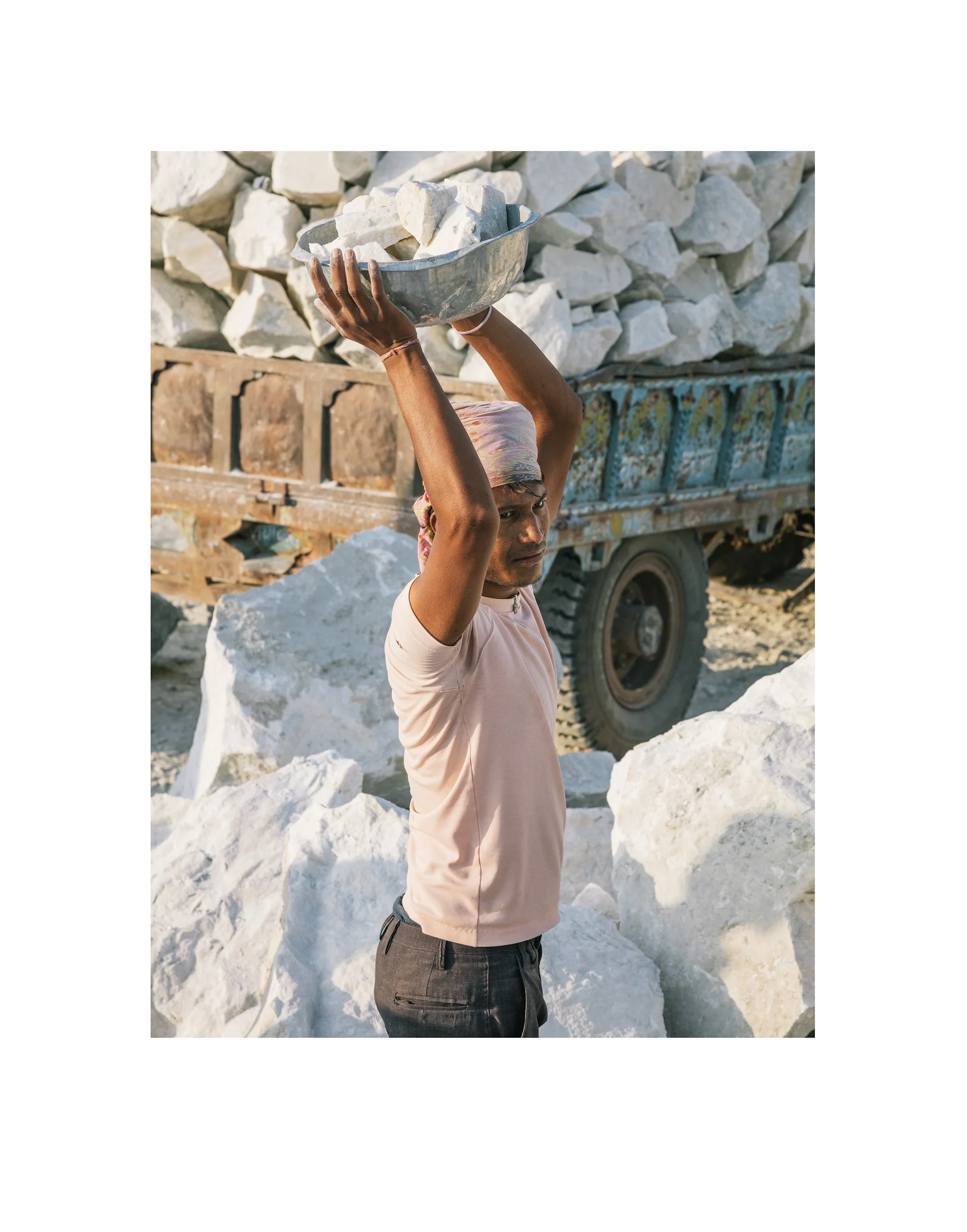4374_ManWithMarble_border.jpg
