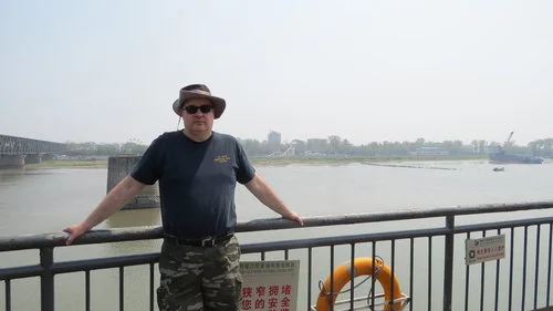 Doc Sewell in Dandong, China, across the Yalu River from Shinuiju, North Korea