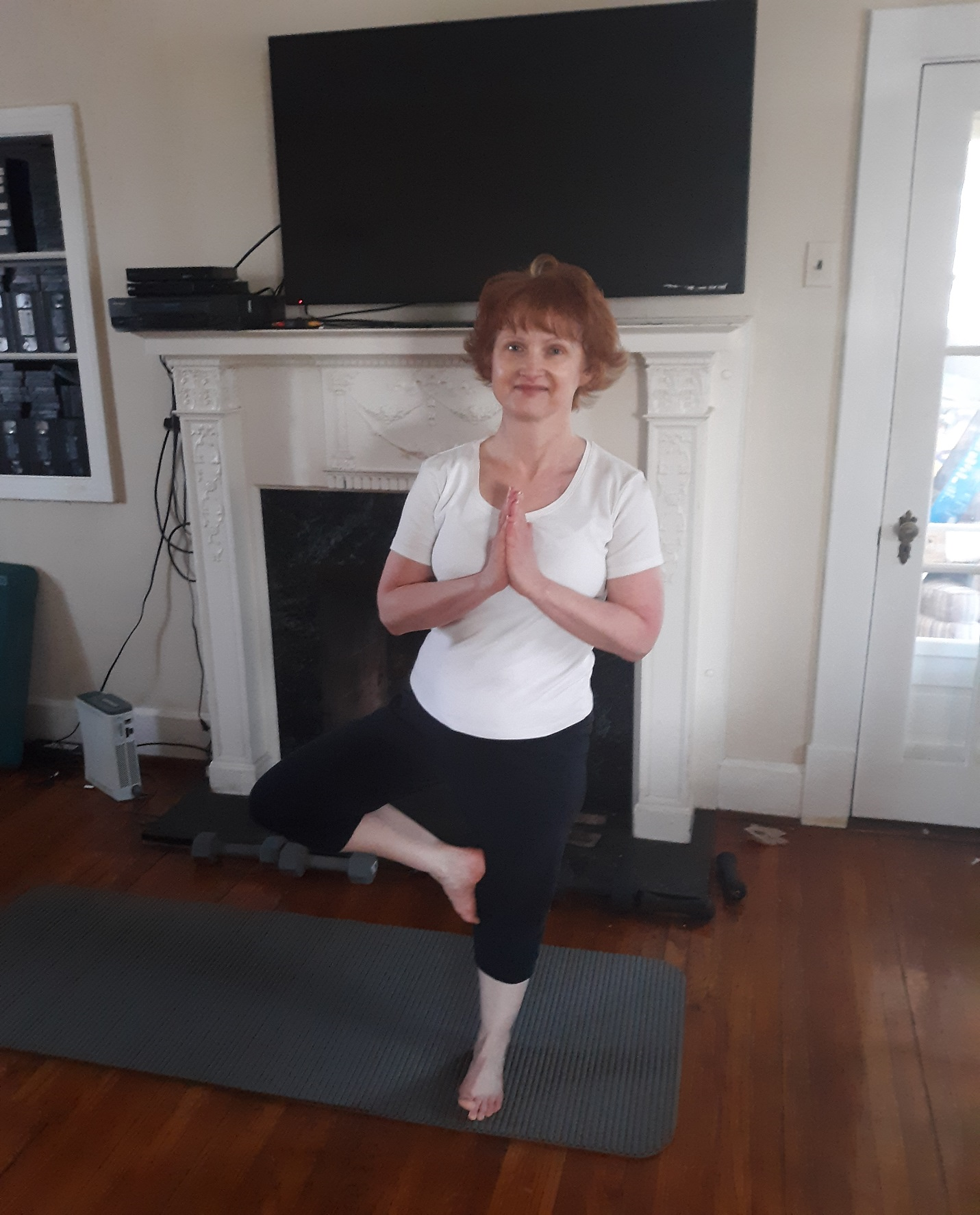 Mary, striking a Yoga Tree Pose