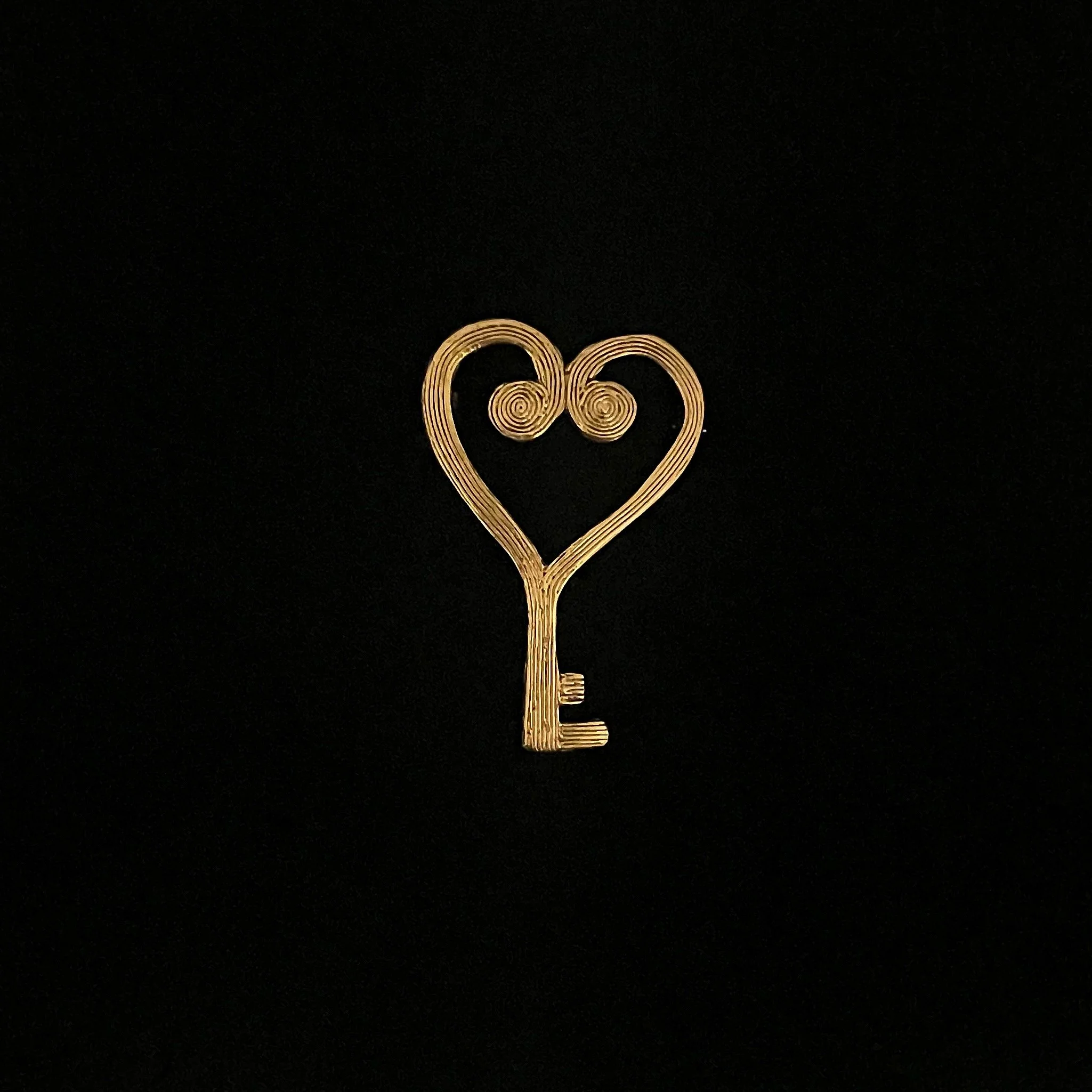 Gold-plated bronze Heart Key brooch by Elisabeth Riveiro, handcrafted in Paris using traditional techniques.