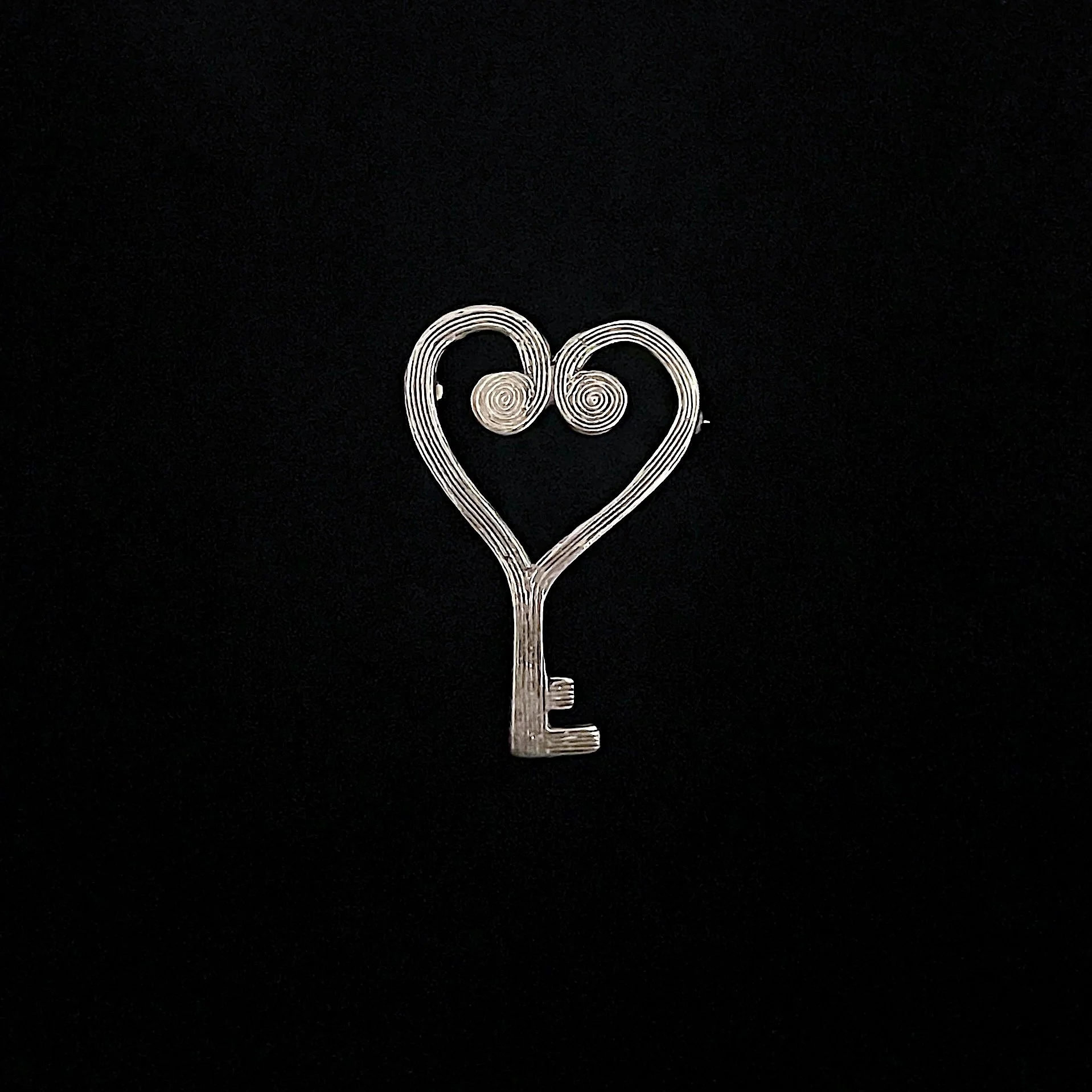 Silver-plated bronze Heart Key brooch by Elisabeth Riveiro, handcrafted using the lost-wax casting technique.