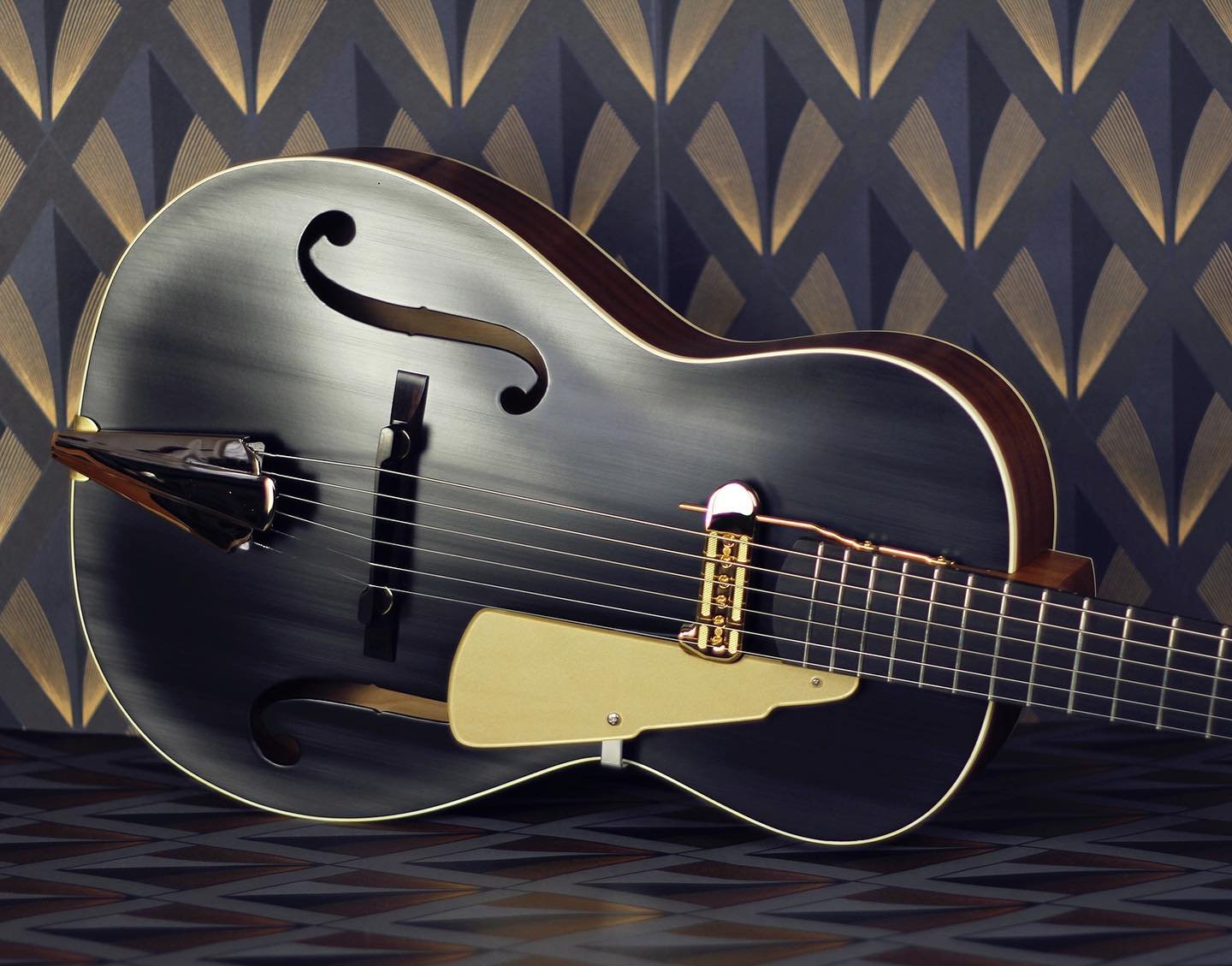 Here&rsquo;s another shot of the latest Rosetta! In brushed satin finish, this is a spruce top guitar with sapele back and sides and gold plated hardware. The guitar explores a new lamination formula for the arched top, offering a slightly clearer/lo