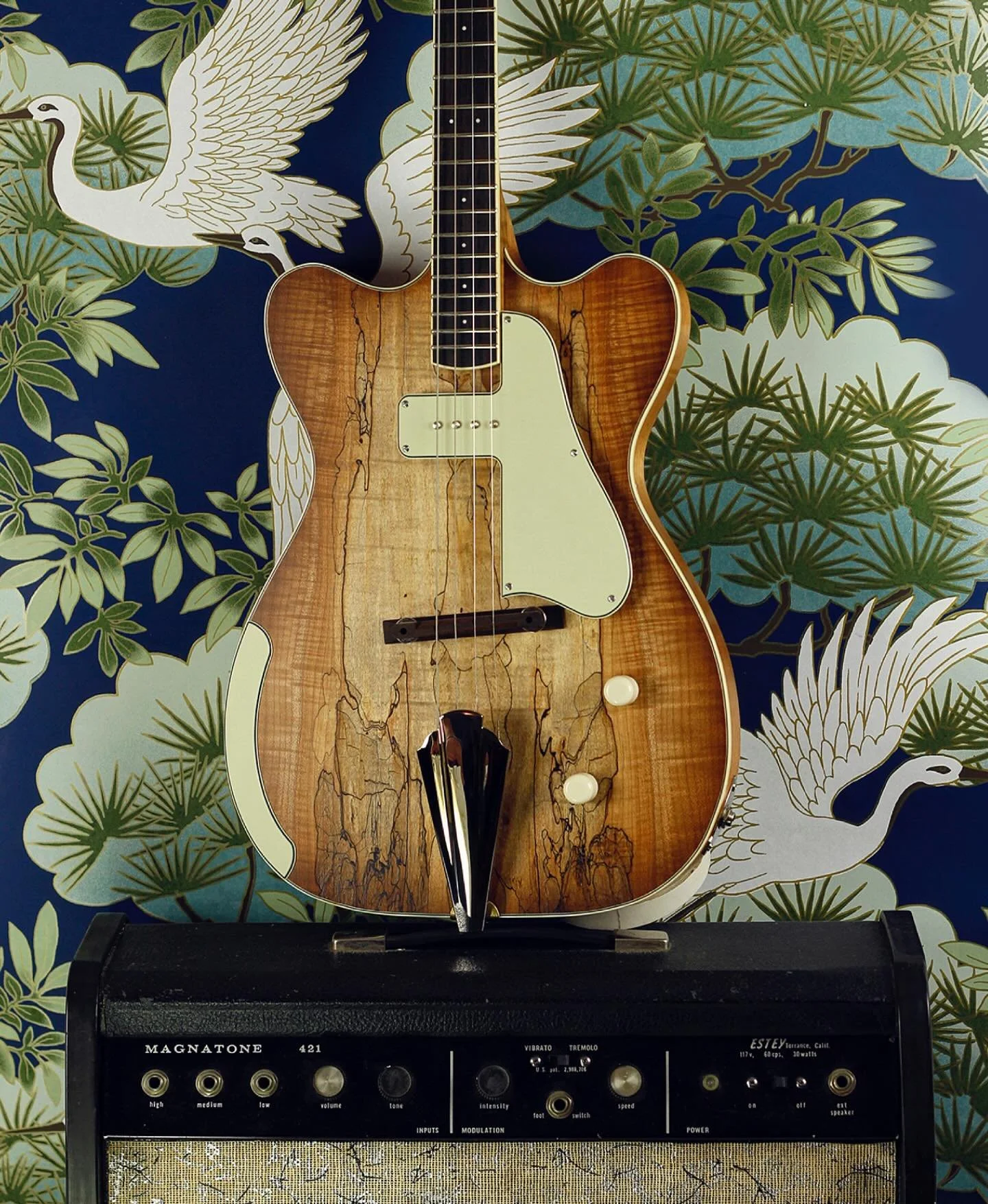 This tenor electric guitar has been in the works for quite a while and I&rsquo;m thrilled to finally see it leave the nest! 

This is a 22.75&rdquo; scale instrument, tuned in fifths (GDAE) and features a beautiful spalted maple, lightly bursted top,