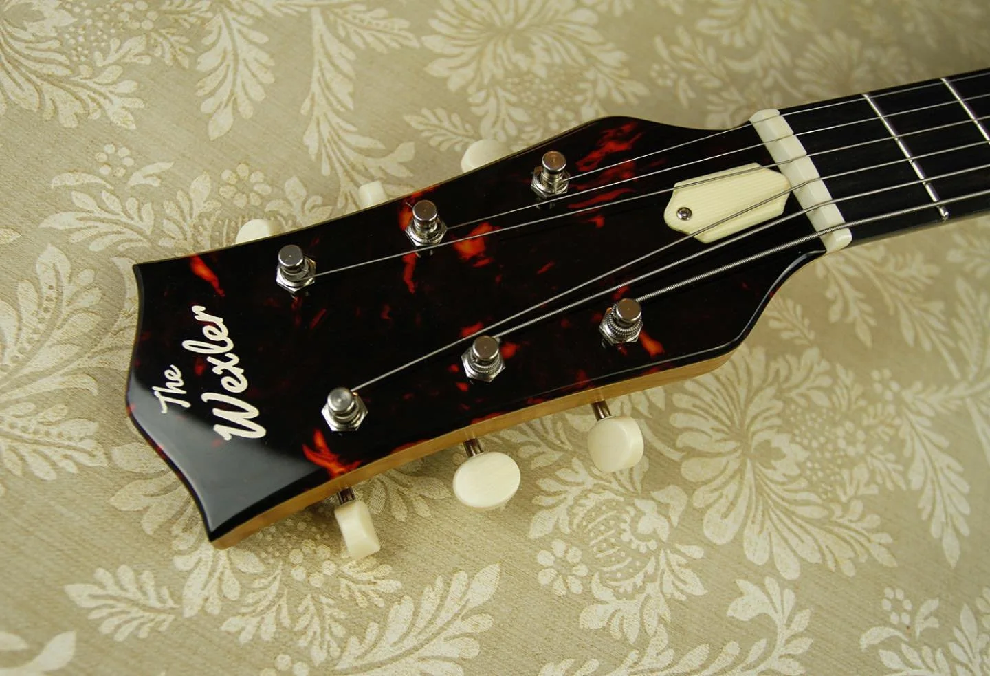 The headstock on this latest Rosetta project was designed specifically for the instrument and meant to capture a specific era of playing but also of guitar manufacturing. We went with a classic tortoise headplate, Ivoroid tuners &amp; accents and a v