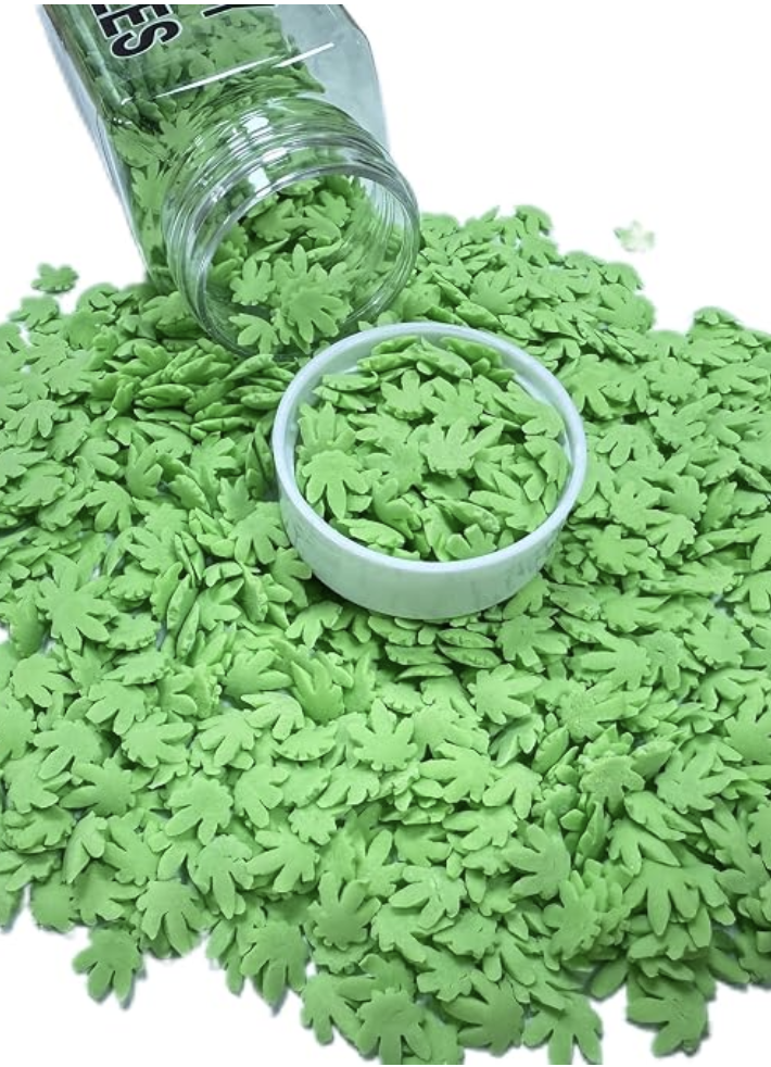 Sprinkles that look like week leaves. Cannabis sprinkles, weed leaf sprinkles, green sprinkles for cake and cupcake decor.