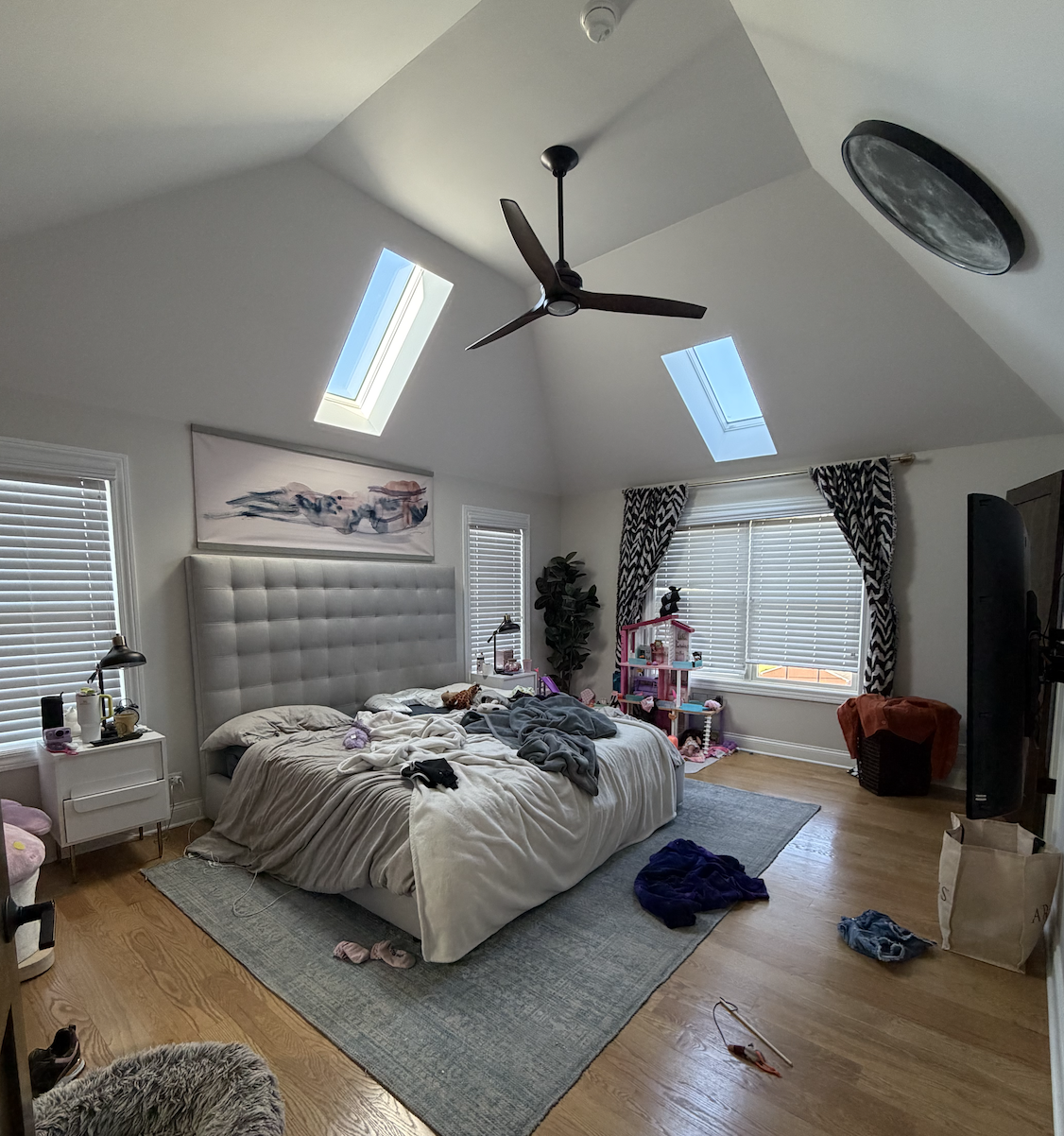 Before photo of my plain bedroom. I am planning to paint this bright room a dark, moody color.
