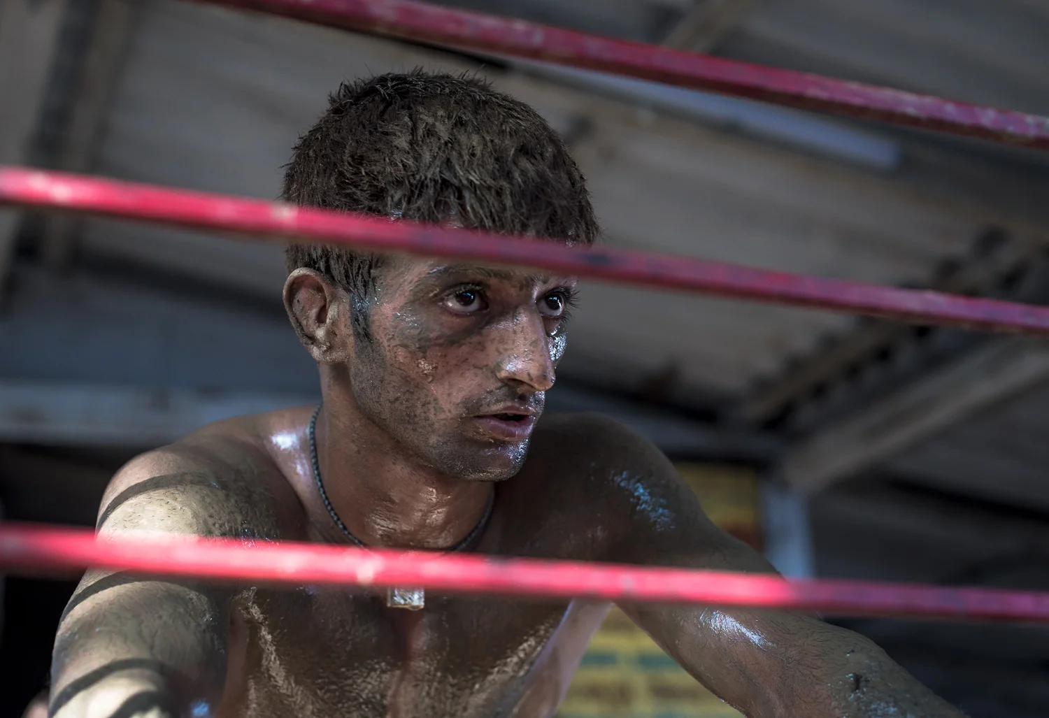 © Ayash Basu. In between workouts, Suraj Kant takes a breather and talks to me about the akhara and its future. "There is diminishing interest in kushti and resources are scarce. We each have to consume 200 grams of almonds, half a pound of ghee (clarified butter), two to three types of vegetables and 3 litres of milk, a day. Without that fuel, our bodies cannot sustain pehlwani . We go to local schools and we also work to afford this akhara and its related expenses. There is no meaningful support from the government either. We have a few individuals who have come and joined the akhara and that helps a little, but I worry how sustainable this is. My father has run this however he could for the last 50 years, soon it will be on me. Let's see."