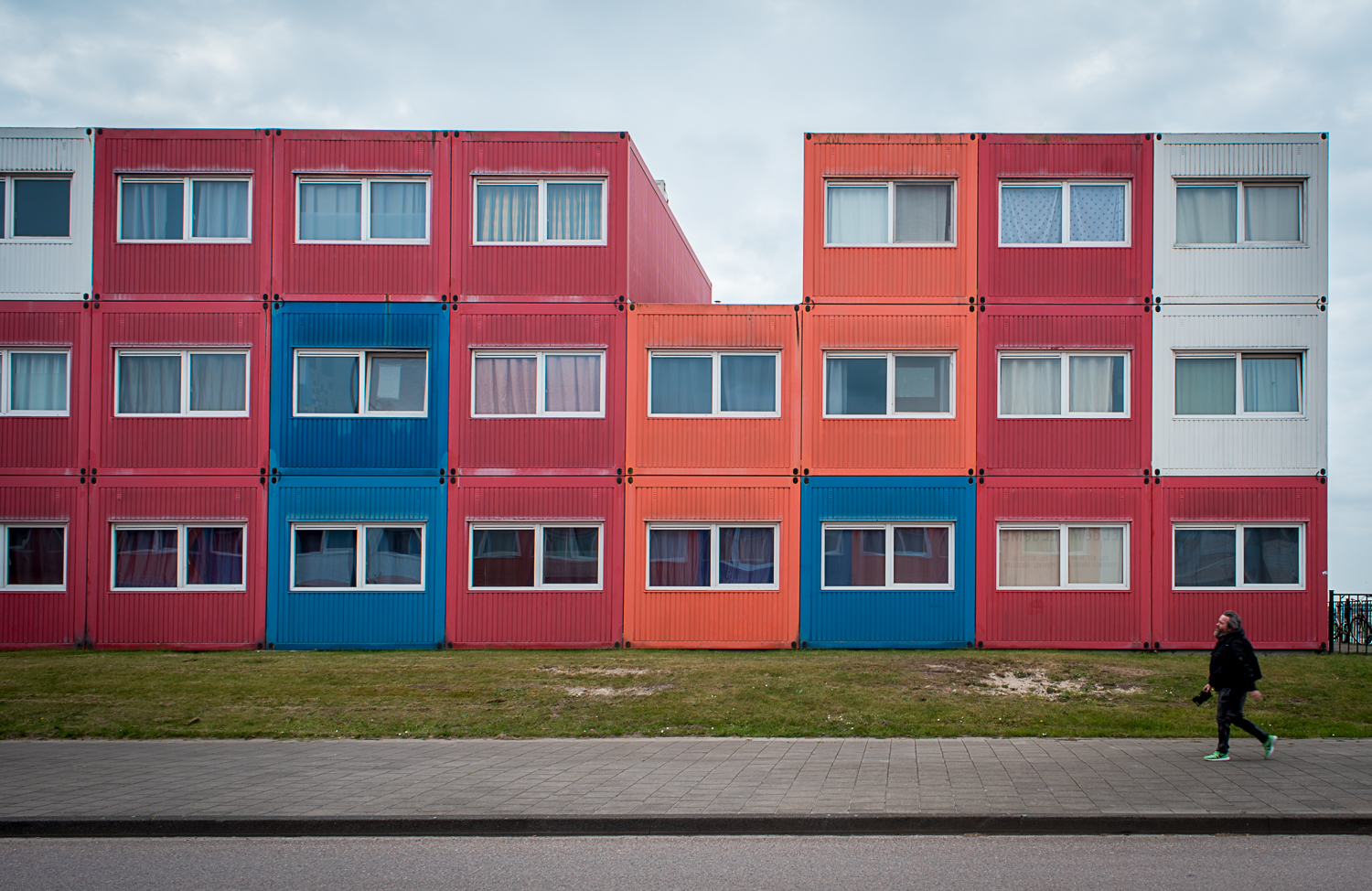 © Ayash Basu. Shipping containers converted into colorful, modular, and super cheap student housing for emerging artists. Yes, it's basic and a metal box but one can't beat the price for being in the heart of Amsterdam, where affordable housing is increasingly a distant dream.