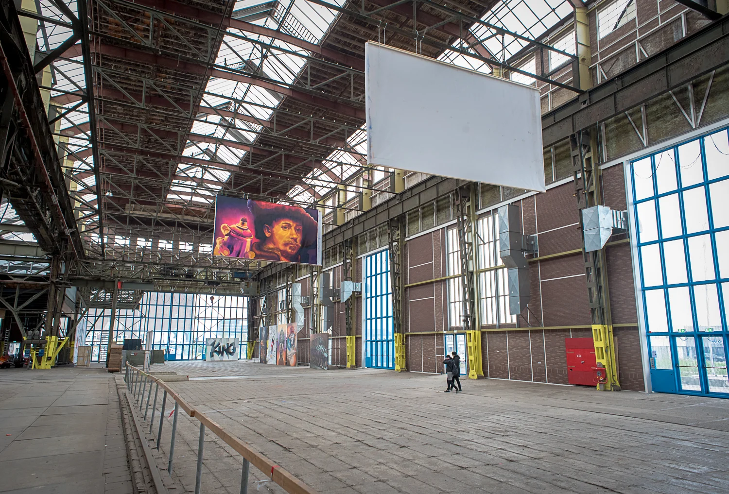 © Ayash Basu. Massive exhibition and display spaces used for gatherings, events and festivals are part of the Kunststad, one of the main hangars of the shipyard.