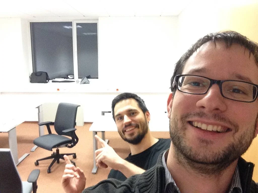 Look how happy we were about our first real office in an actual office building! We even uploaded this burned-out image to Facebook.