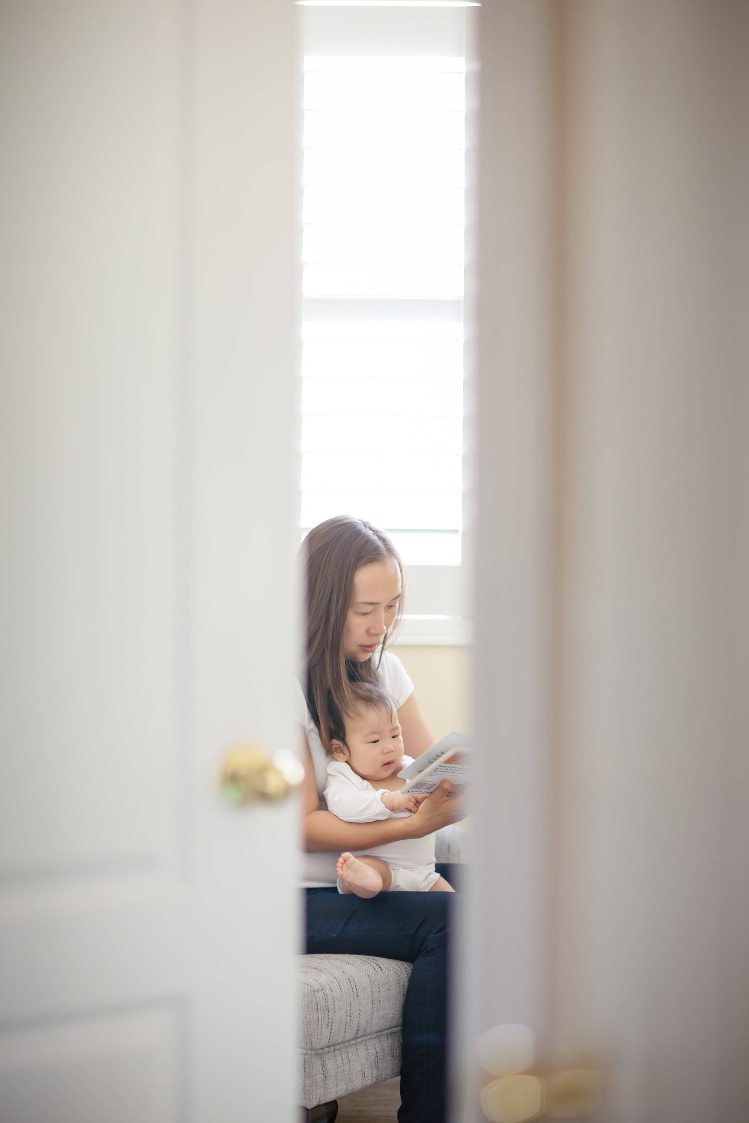 Mother reading story to baby - Sunday Kind of Love baby photographer