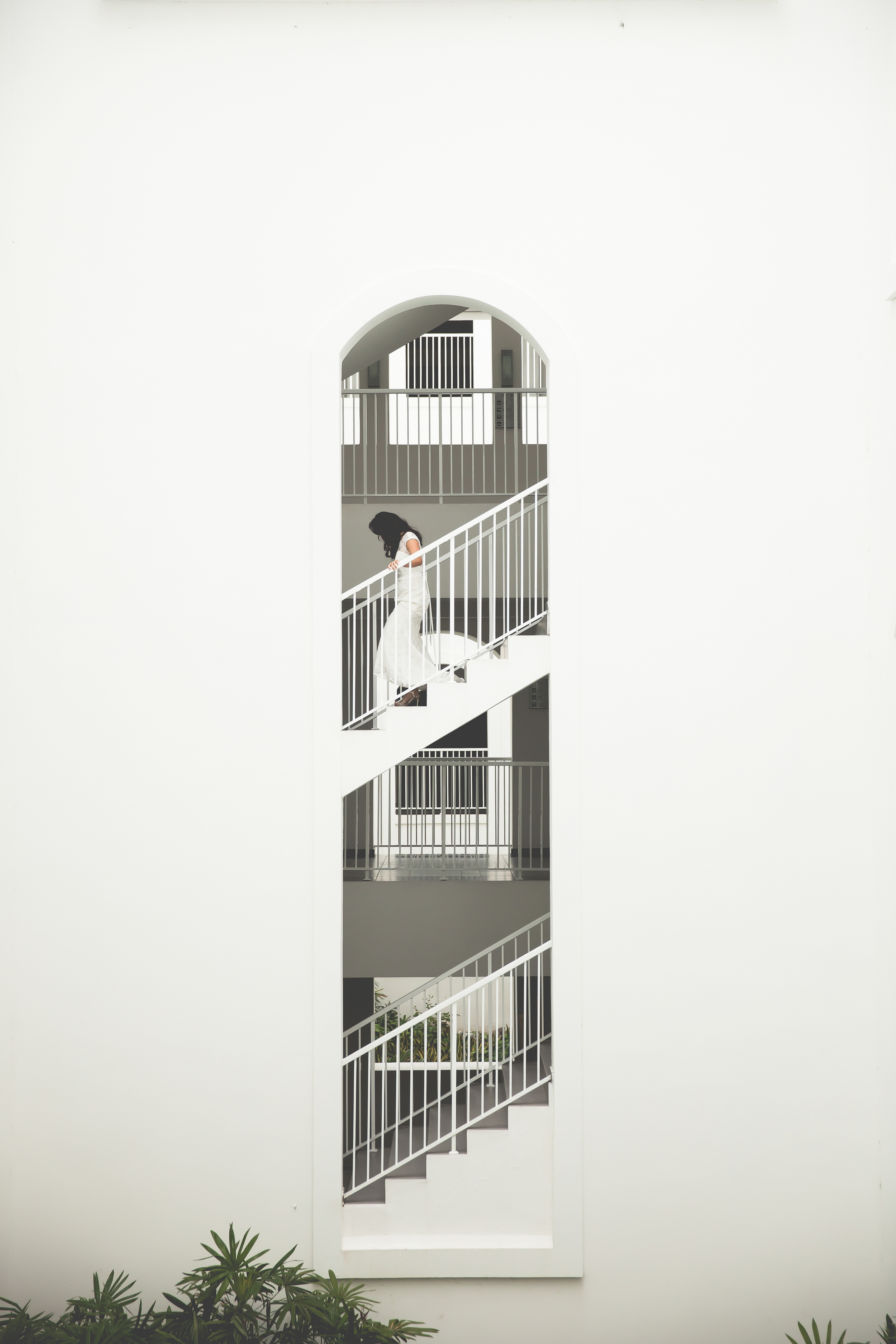 Bride walking down stairs